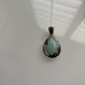 Aventurine and silver tone pendant